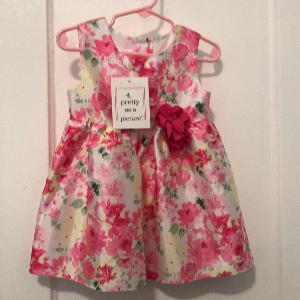 Beautiful, children dress with tag.